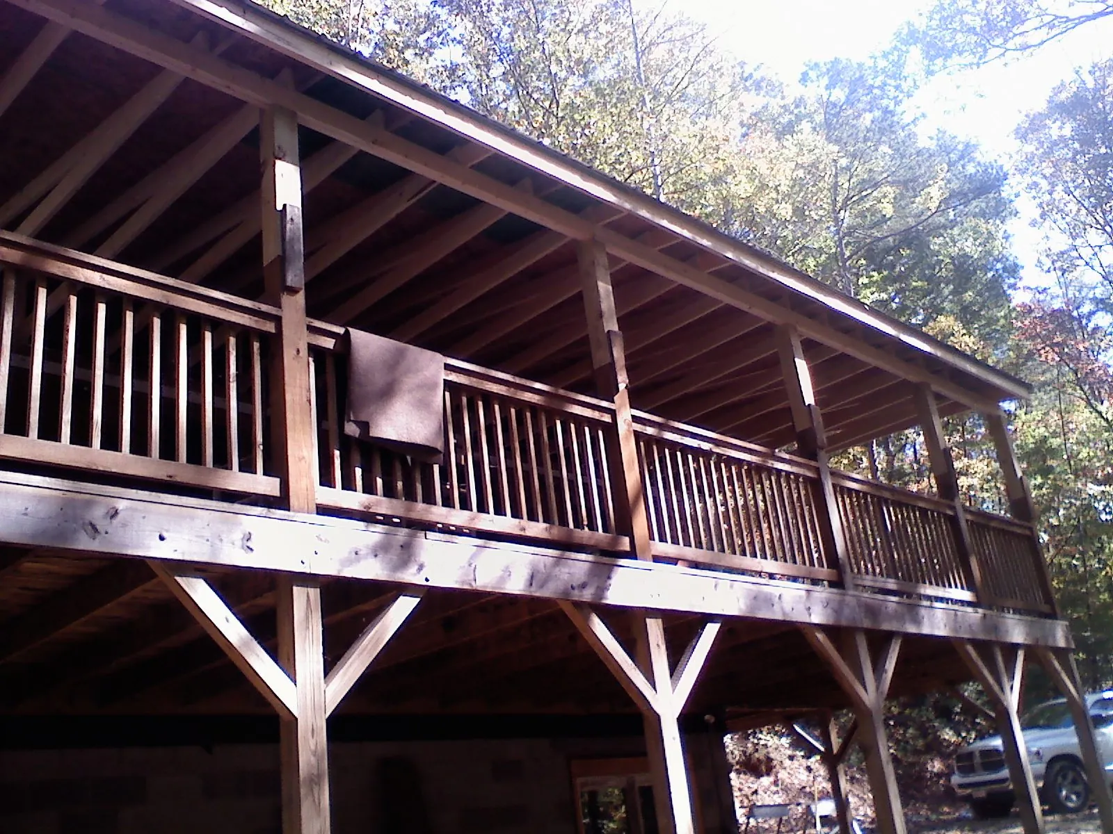 Timber framing under a new elevated porch and deck — Roof Leak Repair in Saint Louis by Roofing Brothers